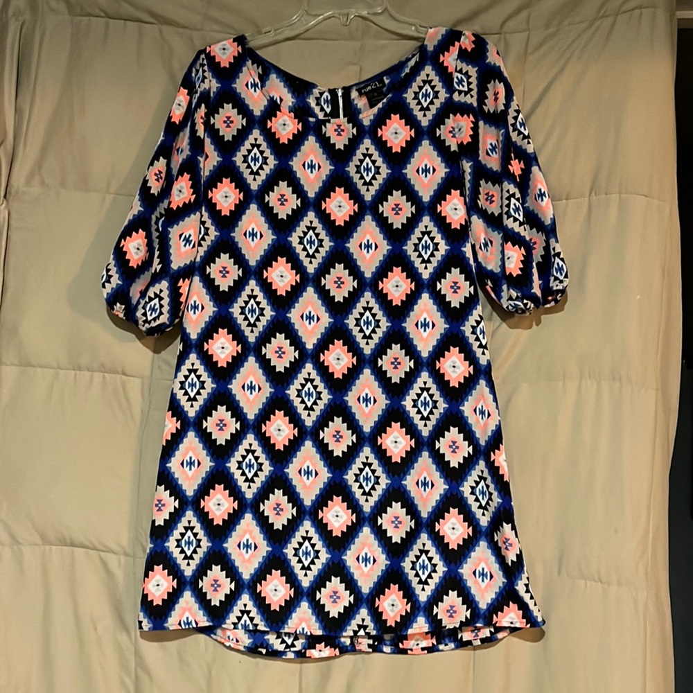 Cute little blue and orange dress. Size medium used